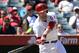 Sep 8, 2013; Anaheim, CA, USA; Los Angeles Angels first baseman Mark Trumbo hits a single against the Texas Rangers in the 4th inning during the game at Angel Stadium of Anaheim. Mandatory Credit: Richard Mackson-USA TODAY Sports