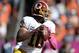 Oct 27, 2013; Denver, CO, USA; Washington Redskins quarterback Robert Griffin III (10) prepares to pass in the first quarter against the Denver Broncos at Sports Authority Field at Mile High. Mandatory Credit: Ron Chenoy-USA TODAY Sports