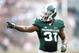 Sep 7, 2013; East Lansing, MI, USA; Michigan State Spartans cornerback Darqueze Dennard (31) points to South Florida Bulls offense during the 2nd half at Spartan Stadium. MSU won 21-6. Mandatory Credit: Mike Carter-USA TODAY Sports