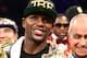LAS VEGAS, NV - SEPTEMBER 14: Floyd Mayweather Jr. celebrates his majority decision victory against Canelo Alvarez in their WBC/WBA 154-pound title fight at the MGM Grand Garden Arena on September 14, 2013 in Las Vegas, Nevada. (Photo by Al Bello/Getty Images)
