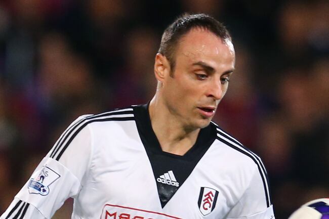 Hi-res-185499152-dimitar-berbatov-of-fulham-controls-the-ball-during-the_crop_north