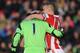 STOKE ON TRENT, ENGLAND - NOVEMBER 02: Asmir Begovic (L) of Stoke City is congratulated by team-mate Ryan Shawcross after scoring the opening goal during the Barclays Premier League match between Stoke City and Southampton on November 02, 2013 in Stoke on Trent, England. (Photo by Chris Brunskill/Getty Images)