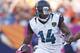 Oct 13, 2013; Denver, CO, USA; Jacksonville Jaguars wide receiver Justin Blackmon (14) runs the ball against the Denver Broncos at Sports Authority Field at Mile High. The Broncos won 35-19. Mandatory Credit: Chris Humphreys-USA TODAY Sports