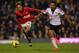 LONDON, ENGLAND - NOVEMBER 02: Kieran Richardson of Fulham pulls on the shirt of Adnan Januzaj of Manchester United during the Barclays Premier League match between Fulham and Manchester United at Craven Cottage on November 2, 2013 in London, England. (Photo by Clive Rose/Getty Images)