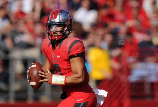 Hi-res-186633320-gary-nova-of-the-rutgers-scarlet-knights-looks-to-pass_crop_north