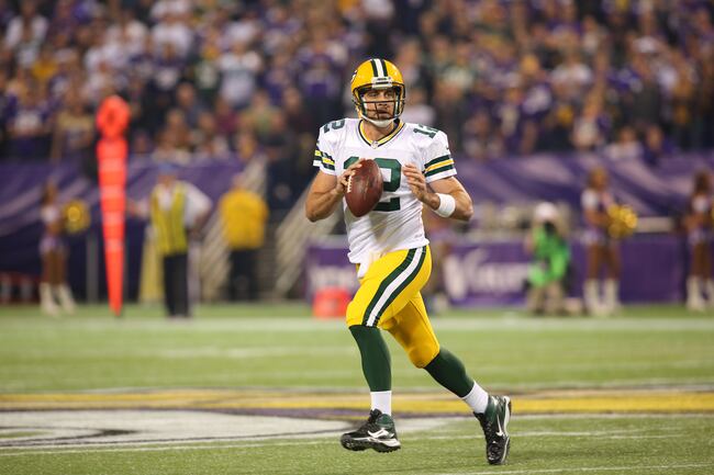 Hi-res-186057632-aaron-rodgers-of-the-green-bay-packers-looks-for-an_crop_north
