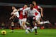 LONDON, ENGLAND - NOVEMBER 02: Laurent Koscielny of Arsenal and Daniel Sturridge of Liverpool battle for the ball during the Barclays Premier League match between Arsenal and Liverpool at Emirates Stadium on November 2, 2013 in London, England. (Photo by Laurence Griffiths/Getty Images)