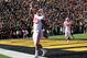 Nov 2, 2013; Iowa City, IA, USA; Wisconsin Badgers running back James White (20) celebrates in the endzone after scoring a touchdown against the Iowa Hawkeyes at Kinnick Stadium. Wisconsin beat Iowa 28-9. Mandatory Credit: Reese Strickland-USA TODAY Sports