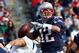 FOXBORO, MA - OCTOBER 27: Tom Brady #12 of the New England Patriots looks for an open man in the first half against the Miami Dolphins at Gillette Stadium on October 27, 2013 in Foxboro, Massachusetts. (Photo by Jim Rogash/Getty Images)