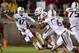 TALLAHASSEE, FL - NOVEMBER 02: Stephen Morris #17 of the Miami Hurricanes is tackled during a game against the Florida State Seminoles at Doak Campbell Stadium on November 2, 2013 in Tallahassee, Florida. (Photo by Mike Ehrmann/Getty Images)
