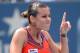 Aug 29, 2013; New York, NY, USA; Flavia Pennetta (ITA) reacts to a line call in her match against Sara Errani (ITA) on day four of the 2013 US Open at the Billie Jean King National Tennis Center. Mandatory Credit: Robert Deutsch-USA TODAY Sports