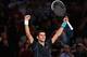 PARIS, FRANCE - NOVEMBER 02: Novak Djokovic of Serbia celebrates defeating Roger Federer of Switzerland during day six of the BNP Paribas Masters at Palais Omnisports de Bercy on November 2, 2013 in Paris, France. (Photo by Julian Finney/Getty Images)