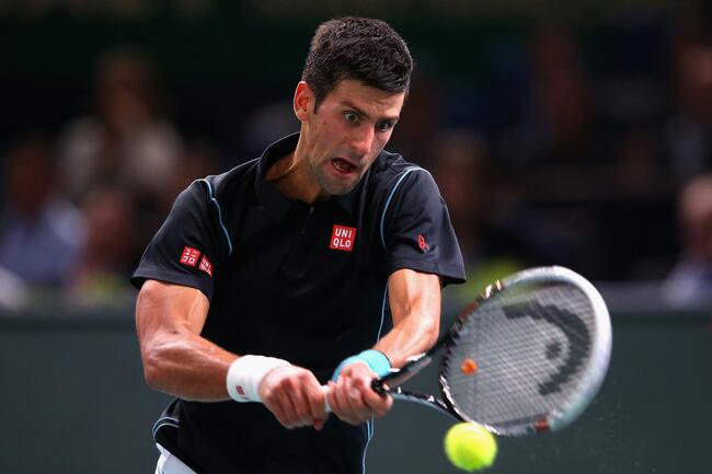 Hi-res-186706828-novak-djokovic-of-serbia-in-action-against-david-ferrer_crop_north