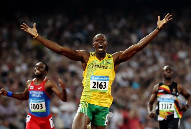 Hi-res-82477643-usain-bolt-of-jamaica-reacts-after-breaking-the-world_crop_north