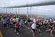 NEW YORK, NY - NOVEMBER 03: Runners cross the Verrazano-Narrows Bridge at the start of the ING New York City Marathon on November 3, 2013 in the Brooklyn borough of New York City. (Photo by Maddie Meyer/Getty Images)