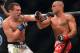 Nov 2, 2013; Long Beach, CA, USA; Eddie Alvarez (red gloves) and Michael Chandler (blue gloves) during their Bellator lightweight world championship fight at the Long Beach Arena. Alvarez won the fight. Mandatory Credit: Jayne Kamin-Oncea-USA TODAY Sports