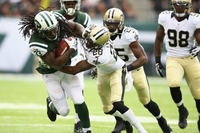 Hi-res-186717258-chris-ivory-of-the-new-york-jets-runs-against-keenan_crop_north