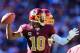 LANDOVER, MD - NOVEMBER 03: Quarterback Robert Griffin III #10 of the Washington Redskins throws a second quarter pass against the San Diego Chargers at FedExField on November 3, 2013 in Landover, Maryland. (Photo by Rob Carr/Getty Images)