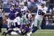Nov 3, 2013; Arlington, TX, USA; Dallas Cowboys wide receiver Dez Bryant (88) runs after catching a pass in the fourth quarter of the game against Minnesota Vikings strong safety Mistral Raymond (41) and cornerback Marcus Sherels (35) at AT&T Stadium. The Dallas Cowboys beat the Minnesota Vikings 27-23. Mandatory Credit: Tim Heitman-USA TODAY Sports