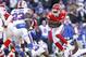 Nov 3, 2013; Orchard Park, NY, USA; Kansas City Chiefs running back Jamaal Charles (25) runs with the ball as Buffalo Bills free safety Aaron Williams (23) pursues during the second half at Ralph Wilson Stadium. Chiefs beat the Bills 23-13. Mandatory Credit: Kevin Hoffman-USA TODAY Sports