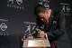 Dec 8, 2012; New York, NY, USA; Texas A&M Aggies quarterback Johnny Manziel kisses the 2012 Heisman Trophy after a press conference at the Marriott Marquis in downtown New York City. Mandatory Credit: Jerry Lai-USA TODAY Sports
