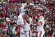 Nov 2, 2013; Fayetteville, AR, USA; Auburn Tigers running back Tre Mason (21) is lifted by offensive tackle Avery Young (56) after scoring a touchdown against the Arkansas Razorbacks during the first quarter at Donald W. Reynolds Razorback Stadium. Mandatory Credit: Nelson Chenault-USA TODAY Sports