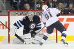 Hi-res-185339335-goaltender-ondrej-pavelec-of-the-winnipeg-jets-denies_crop_north
