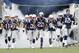 Nov 3, 2013; Foxborough, MA, USA; New England Patriots quarterback Tom Brady (12) leads the team onto the field before the game against the Pittsburgh Steelers during the first quarter at Gillette Stadium. Mandatory Credit: Greg M. Cooper-USA TODAY Sports