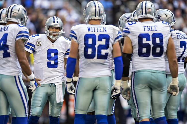 Hi-res-186730039-tony-romo-of-the-dallas-cowboys-in-the-huddle-during-a_crop_north
