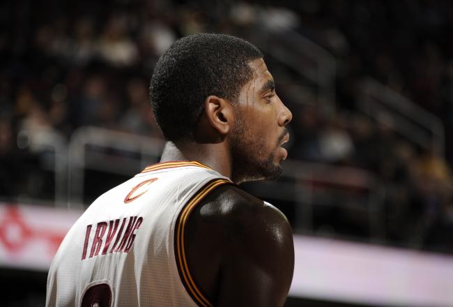 Hi-res-185872615-kyrie-irving-of-the-cleveland-cavaliers-looks-on-during_crop_north