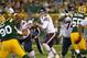GREEN BAY, WI - NOVEMBER 04: Josh McCown #12 of the Chicago Bears looks for a receiver against the Green Bay Packers at Lambeau Field on November 4, 2013 in Green Bay, Wisconsin. (Photo by Jonathan Daniel/Getty Images)