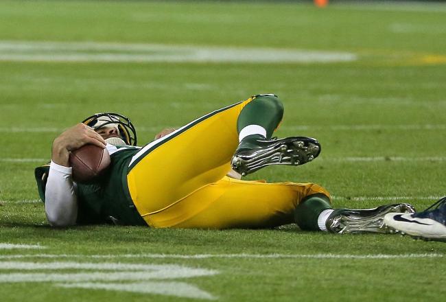 Hi-res-186898499-aaron-rodgers-of-the-green-bay-packers-lays-on-the_crop_north