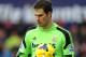 STOKE ON TRENT, ENGLAND - NOVEMBER 02: Asmir Begovic of Stoke City holds the match ball during the Barclays Premier League match between Stoke City and Southampton on November 02, 2013 in Stoke on Trent, England. (Photo by Chris Brunskill/Getty Images)
