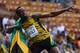 MOSCOW, RUSSIA - AUGUST 17: Usain Bolt of Jamaica celebrates winning the gold medal in the Men's 200 metres final during Day Eight of the 14th IAAF World Athletics Championships Moscow 2013 at Luzhniki Stadium on August 17, 2013 in Moscow, Russia. (Photo by Cameron Spencer/Getty Images)