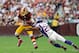 LANDOVER, MD - OCTOBER 14: Brandon Banks #16 of the Washington Redskins is tackled by Chris Cook #20 of the Minnesota Vikings in the first half of a game at FedExField on October 14, 2012 in Landover, Maryland. (Photo by Patrick McDermott/Getty Images)