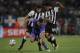 THESSALONIKI, GREECE - SEPTEMBER 15: Pablo Garcia (L) and his team mate Diego Arias of PAOK defend as Iago Falque of Tottenham attacks during the UEFA Europa League group A match between PAOK FC and Tottenham Hotspur at Toumpa Stadium on September 15, 2011 in Thessaloniki, Greece. (Photo by Vladimir Rys/Getty Images)