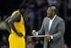 Oct 8, 2013; Cleveland, OH, USA; Cleveland Cavaliers head coach Mike Brown talks to power forward Anthony Bennett (15) in the first quarter against the Milwaukee Bucks at Quicken Loans Arena. Mandatory Credit: David Richard-USA TODAY Sports