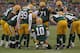 GREEN BAY, WI - JANUARY 01: Matt Flynn #10 of the Green Bay Packers calls a play in the huddle against the Detroit Lions at Lambeau Field on January 1, 2012 in Green Bay, Wisconsin. The Packers defeated the Lions 45-41. (Photo by Jonathan Daniel/Getty Images)