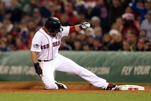 Hi-res-186592622-jacoby-ellsbury-of-the-boston-red-sox-slides-into-first_crop_north