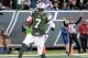 Nov 3, 2013; East Rutherford, NJ, USA; New York Jets quarterback Geno Smith (7) scores a touchdown against the New Orleans Saints in the second half during the game at MetLife Stadium. Mandatory Credit: Robert Deutsch-USA TODAY Sports