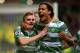 GLASGOW, SCOTLAND - OCTOBER 22: James Forrest (L) of Celtic is congratulated by teammate Virgil van Dijk of Celtic after scoring the opening goal from the penalty spot during the UEFA Champions League Group H match between Celtic and Ajax at Celtic Park Stadium on October 22, 2013 in Glasgow, Scotland. (Photo by Jeff J Mitchell/Getty Images)