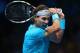LONDON, ENGLAND - NOVEMBER 05: Rafael Nadal of Spain hits a backhand in his men's singles match against David Ferrer of Spain during day two of the Barclays ATP World Tour Finals at O2 Arena on November 5, 2013 in London, England. (Photo by Clive Brunskill/Getty Images)