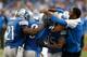 DETROIT, MI - OCTOBER 27: Matthew Stafford #9 of the Detroit Lions celebrates his game winning touchdown with Nate Burleson (far right), Joique Bell #35 and Reggie Bush #21 while playing the Dallas Cowboys at Ford Field on October 27, 2013 in Detroit, Michigan. Detroit won the game 31-30. (Photo by Gregory Shamus/Getty Images)
