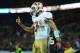 LONDON, ENGLAND - OCTOBER 27: #7 Colin Kaepernick of the San Francisco 49ers celebrates after scoring a touchdown during the NFL International Series game between San Francisco 49ers and Jacksonville Jaguars at Wembley Stadium on October 27, 2013 in London, England. (Photo by Jamie McDonald/Getty Images)