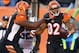 CINCINNATI, OH - OCTOBER 27: Marvin Jones #82 of the Cincinnati Bengals celebrates with Anthony Collins #73 (left) after scoring a touchdown during the NFL game against the New York Jets at Paul Brown Stadium on October 27, 2013 in Cincinnati, Ohio. (Photo by Andy Lyons/Getty Images)
