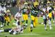 Nov 4, 2013; Green Bay, WI, USA; Green Bay Packers running back Eddie Lacy (27) breaks a tackle by Chicago Bears safety Chris Conte (47) for a 57-yard run in the 3rd quarter at Lambeau Field. Mandatory Credit: Benny Sieu-USA TODAY Sports