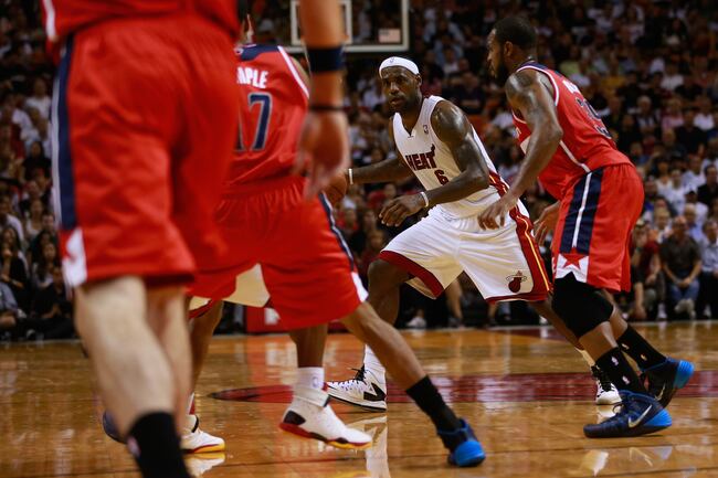 Hi-res-186884815-lebron-james-of-the-miami-heat-dribbles-the-ball-during_crop_north