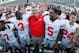 EAST LANSING, MI - SEPTEMBER 29: Head coach Urban Meyer of the Ohio State Buckeyes celebrates with his players after beating the Michigan State Spartans 17-16 at Spartan Stadium on September 29, 2012 in East Lansing, Michigan. (Photo by Gregory Shamus/Getty Images)