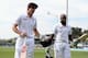 HOBART, AUSTRALIA - NOVEMBER 06: England captain Alastair Cook and Michael Carberry salute the crowd as they leave the field at the end of day one of the tour match between Australia A and England at Blundstone Arena on November 6, 2013 in Hobart, Australia. (Photo by Gareth Copley/Getty Images)
