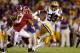 BATON ROUGE, LA - NOVEMBER 03: Jeremy Hill #33 of LSU carries the ball against Deion Belue #13 of Alabama at Tiger Stadium on November 3, 2012 in Baton Rouge, Louisiana. (Photo by Matthew Stockman/Getty Images)